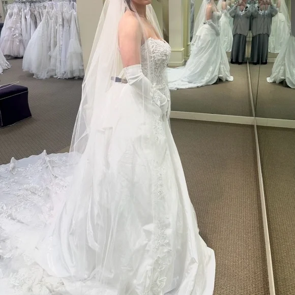 Elegant White Wedding Gown with Lace Details